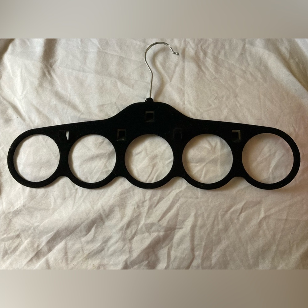 Felt Belt & tie hanger with black felt on it Has open slots at top for ties New